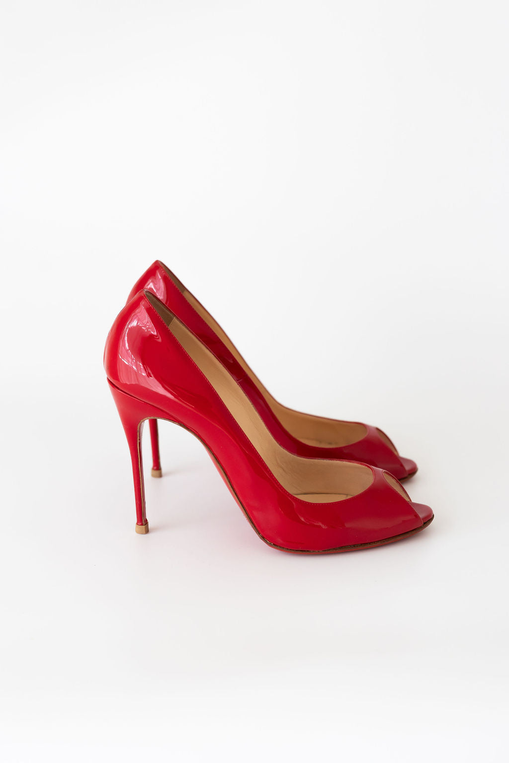 CHRISTIAN LOUBOUTIN Sexy 100 patent leather pumps