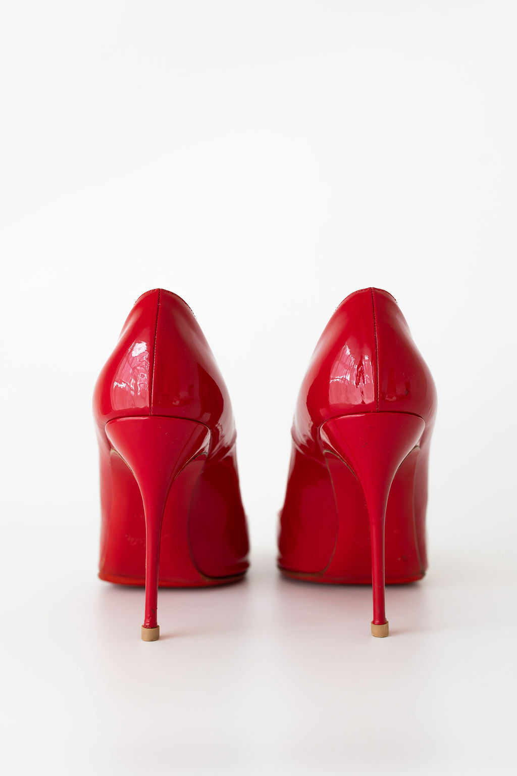 CHRISTIAN LOUBOUTIN Sexy 100 patent leather pumps