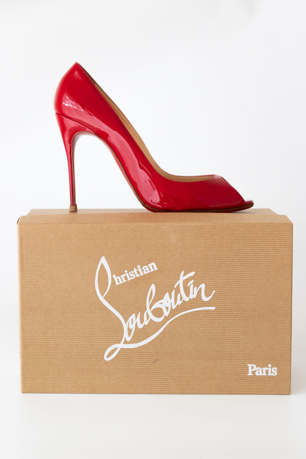 CHRISTIAN LOUBOUTIN Sexy 100 patent leather pumps